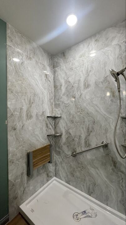 Finished accessible acrylic shower